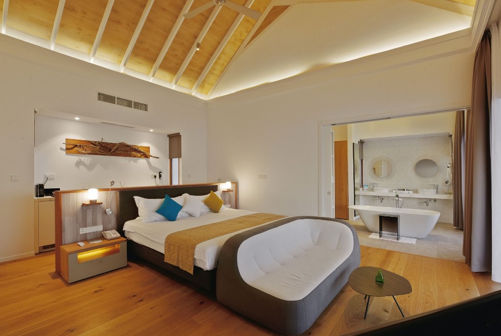 sunset water villa bedroom